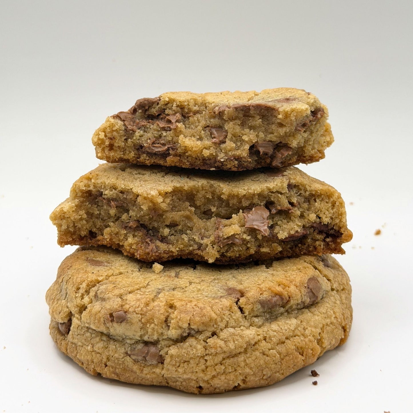 Stack of chocolate chip cookies on a white background