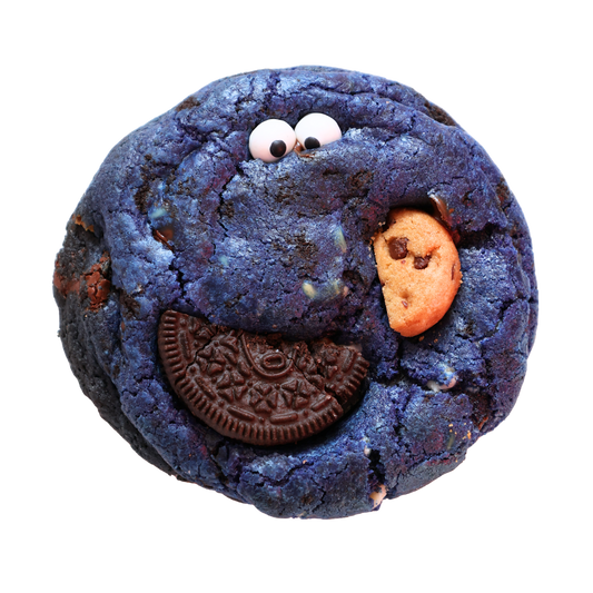 Blue cookie with Oreo and chocolate chip design on a white background